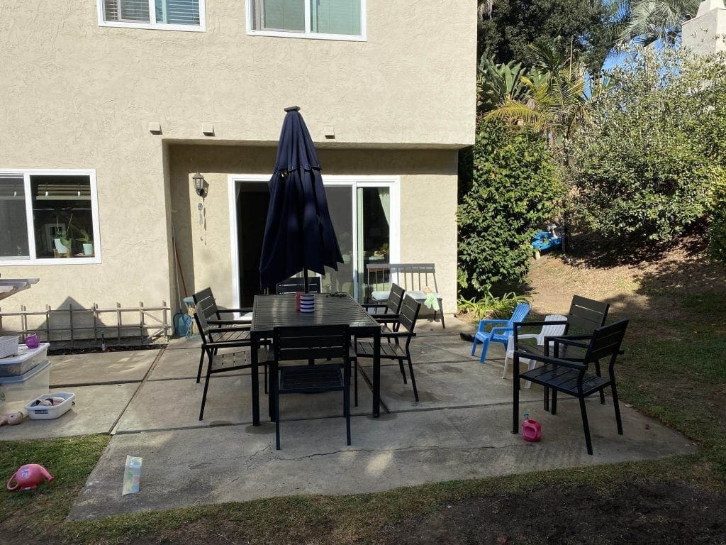 Backyard Patio before outdoor string lights DIY project